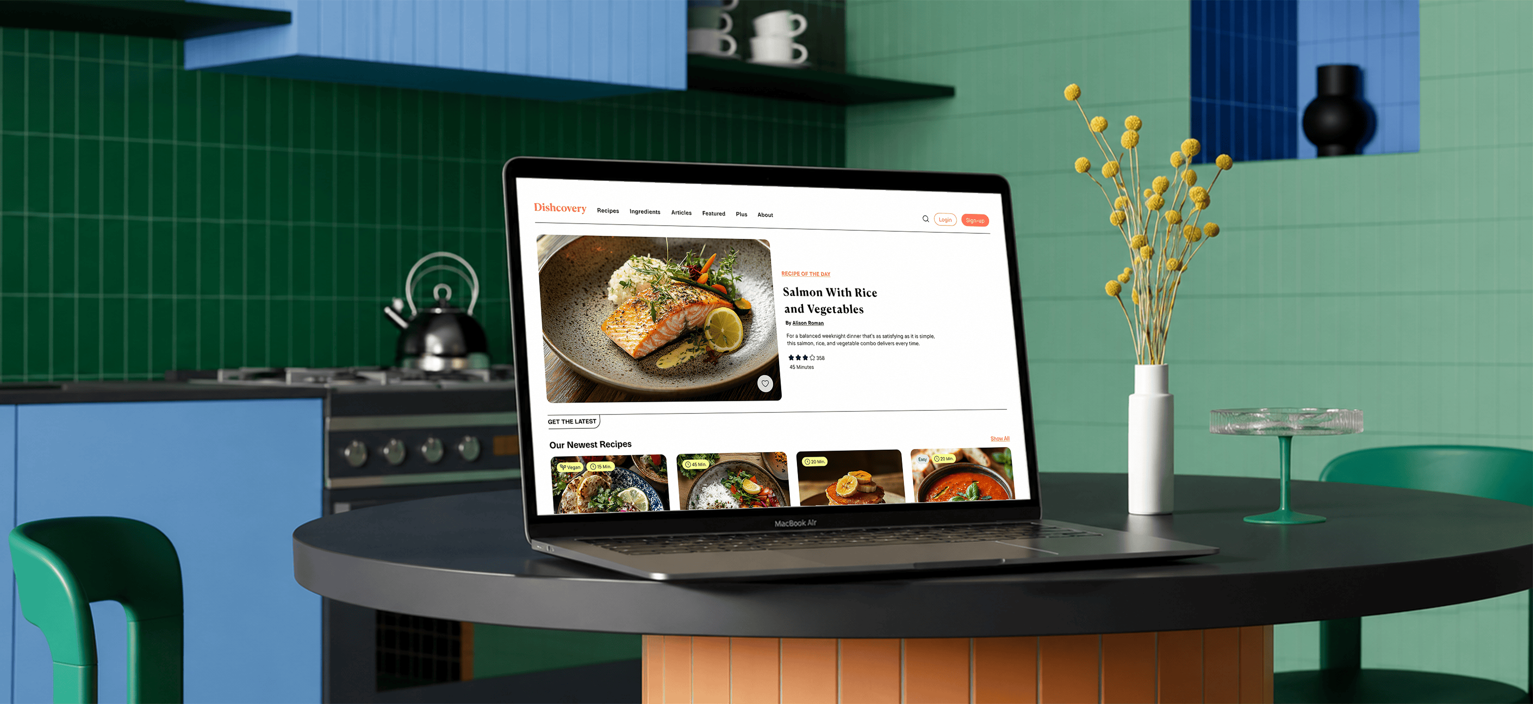 Dishcovery web app on a MacBook against a green-and-blue tiled kitchen
