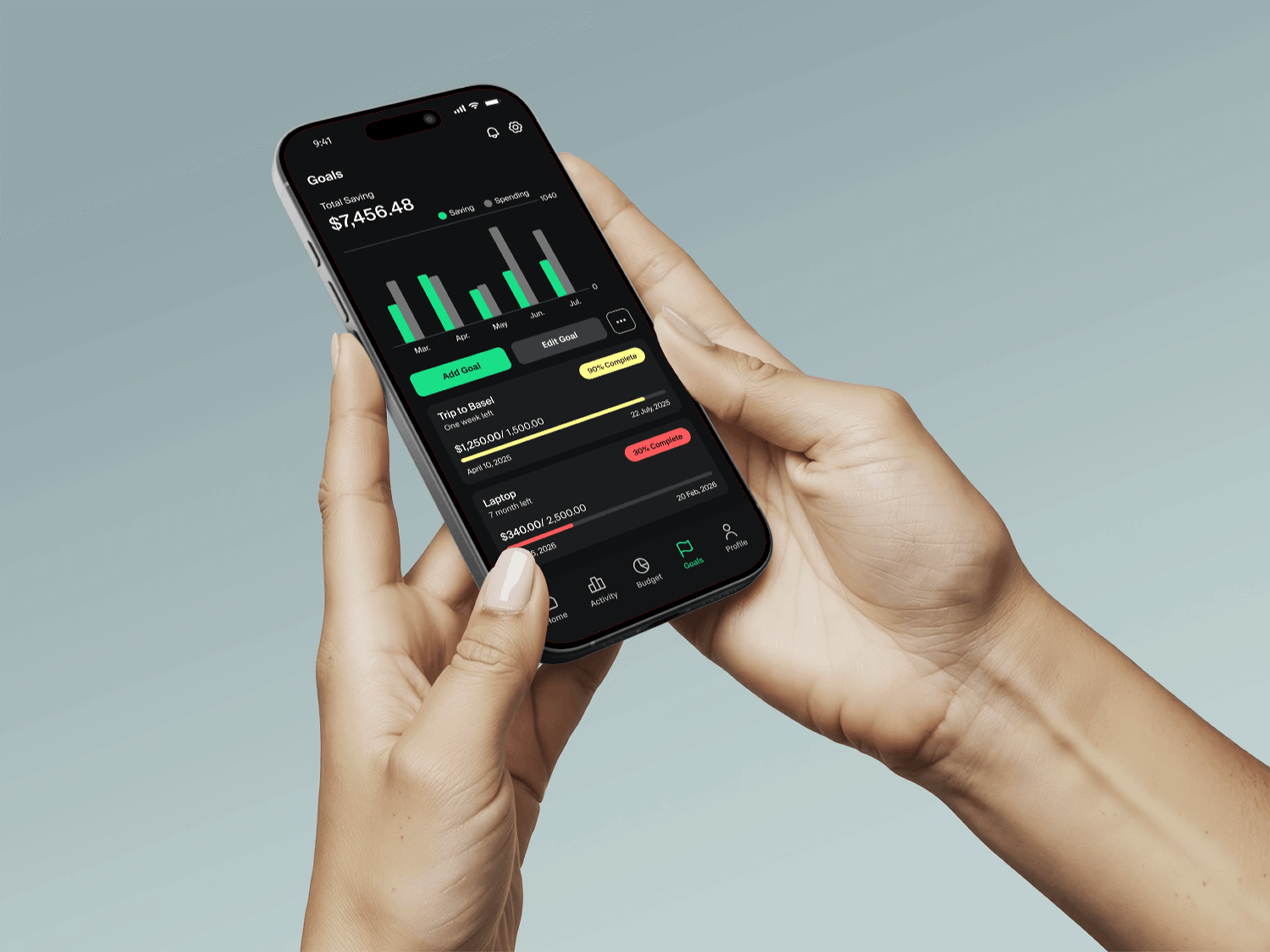 Grava app held in hand showing the Home dashboard